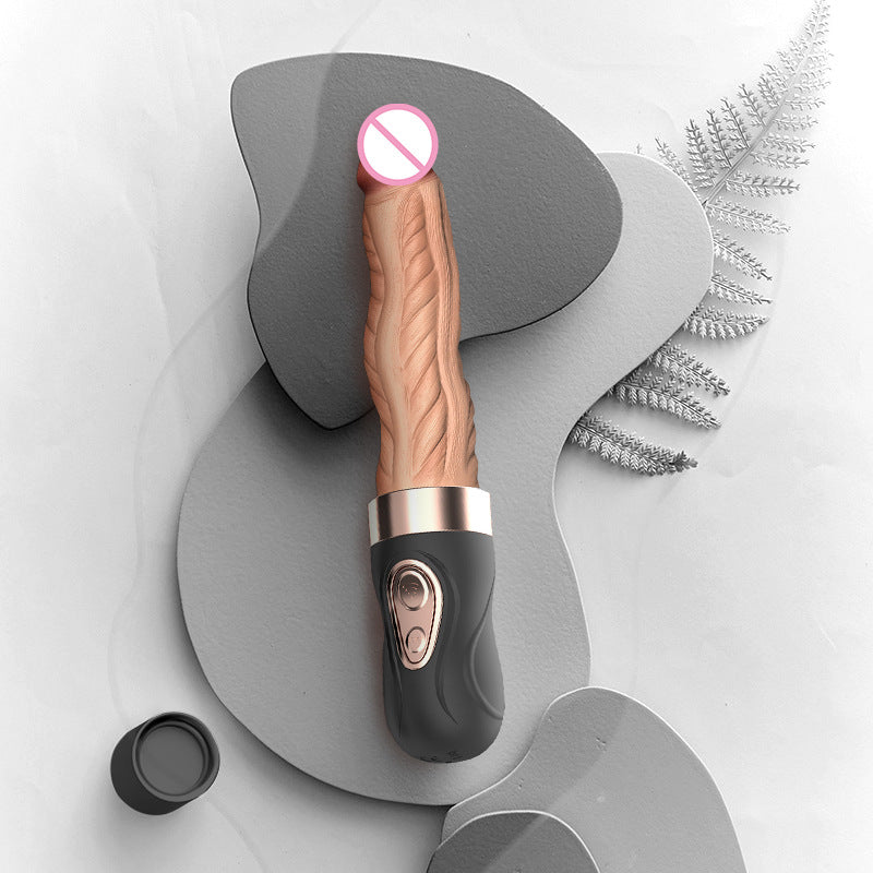 Automatic telescopic peristaltic  thrust and heated artificial dildo